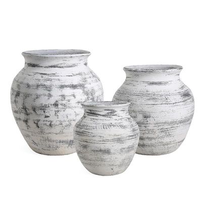 comprare Piantatrici di fiori in cemento in fibra durevoli con drenaggio online manufacture