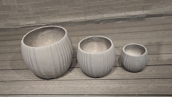 comprare Moderni piantini decorativi rotondi scolpiti a mano per la decorazione interna e esterna degli hotel online manufacture