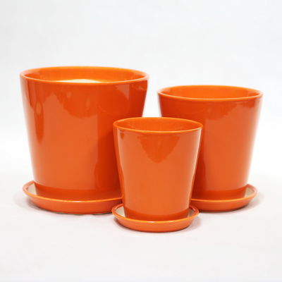 Decorazione interna Pottine di ceramica arancione artigianali con buchi di drenaggio