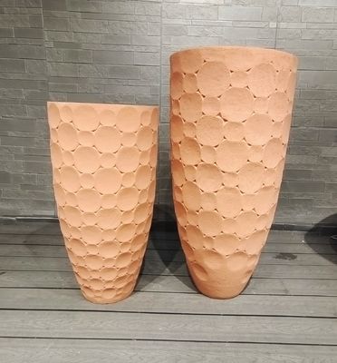 Terracotta calda di tonalità arrotondata piantatrice in argilla di fibra con piastrelle arrotondate